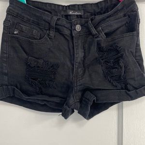 KanCan black denim shorts.